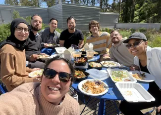Group of MacKenzie lab members having lunch.
